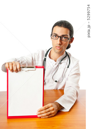 Doctor sitting at the desk on white 5299754