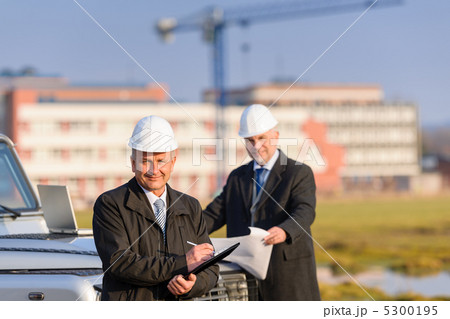 Architect man make notes on construction site Architect man make notes on construction site 5300195