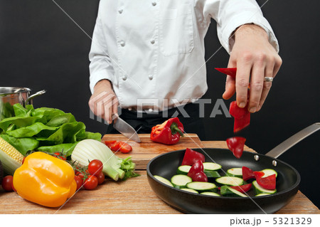 Chef adding ingredients 5321329