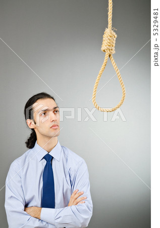 Businessman with thoughts of suicide Businessman with thoughts of suicide 5329481