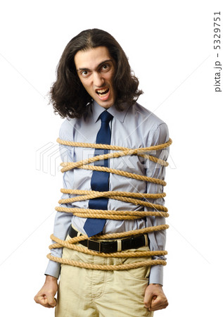 Young businessman tied with rope Young businessman tied with rope 5329751