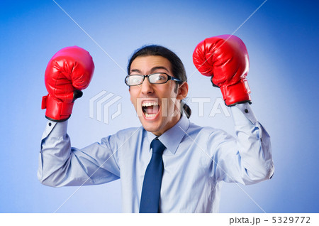 Businessman with boxing gloves 5329772
