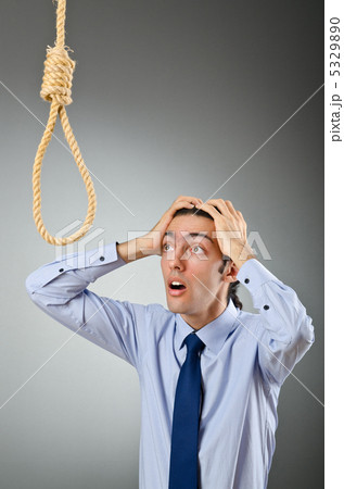 Businessman with thoughts of suicide Businessman with thoughts of suicide 5329890
