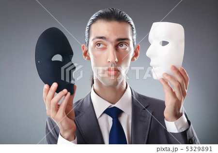 Industrial espionate concept with masked businessman Industrial espionate concept with masked businessman 5329891