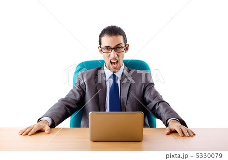 Businessman sitting at the desk 5330079