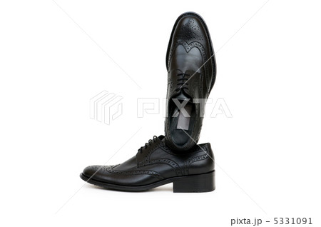 Black shoes isolated on the white background 5331091