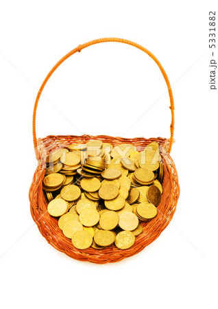 Basket full of coins isolated on white 5331882