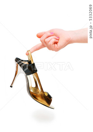 Hand holding woman shoe isolated on white Hand holding woman shoe isolated on white 5332069