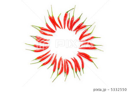 Red chili peppers isolated on the white 5332550