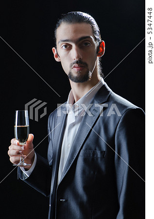 Man tasting wine in glass Man tasting wine in glass 5347448