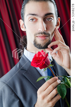 Young man with red rose Young man with red rose 5348278