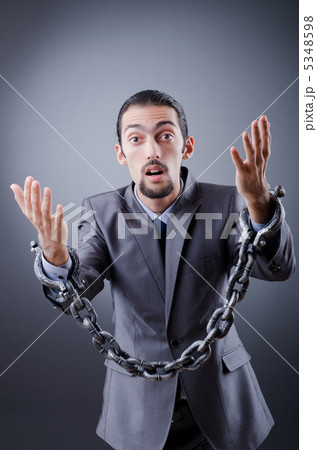 Arrested businessman in studio shooting 5348598