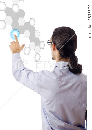 Businessman pressing virtual buttons Businessman pressing virtual buttons 5353370