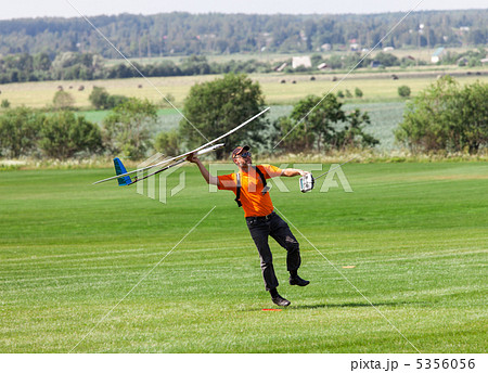 Man launches into the sky RC glider 5356056