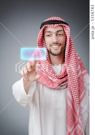 Young arab pressing virtual buttons Young arab pressing virtual buttons 5356783