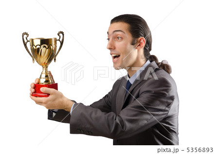 Man being awarded with golden cup Man being awarded with golden cup 5356893
