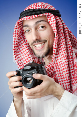 Arab photographer in studio shooting 5357183