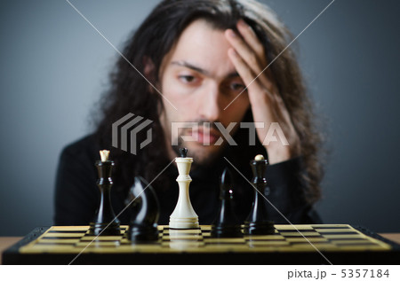 Chess player playing his game 5357184