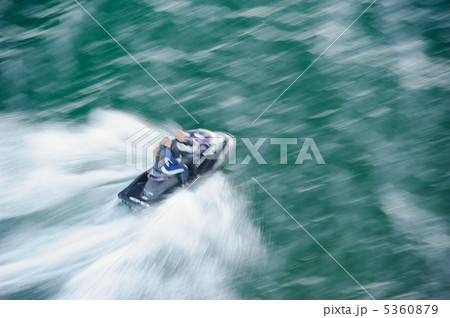 Riding on jet ski 5360879