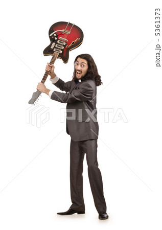 Guitar player in business suit on white Guitar player in business suit on white 5361373