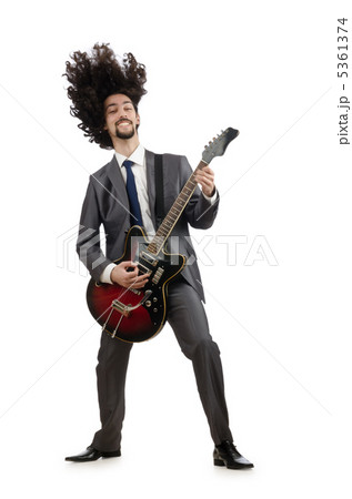 Guitar player in business suit on white 5361374
