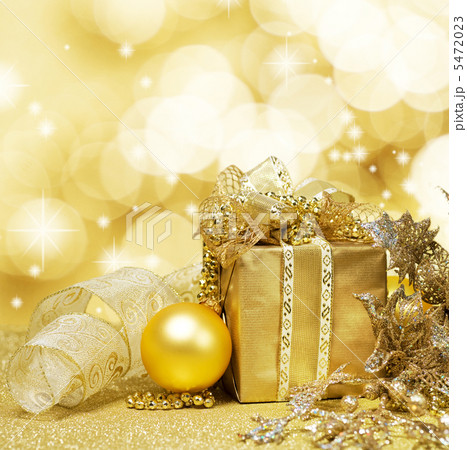 Christmas Decoration over Glittering Golden Background 5472023