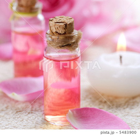 Bottles of Essential Oil for Aromatherapy. Rose Spa Bottles of Essential Oil for Aromatherapy. Rose Spa 5483900