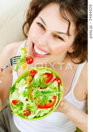 Diet. Healthy Young Woman Eating Vegetable Salad 5484029