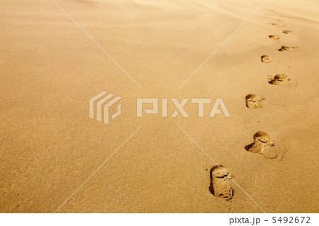 Footprints on the sand 5492672