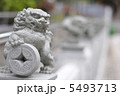 Chinese lion deity with old coin 5493713