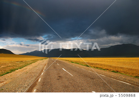 Rainbow over road 5509868