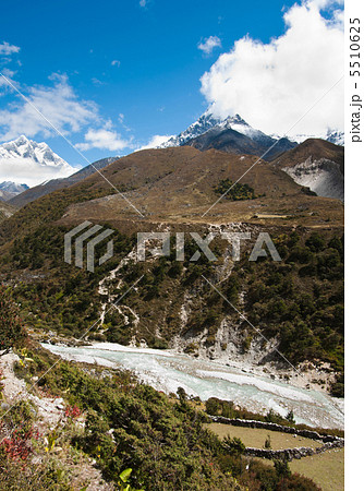Himalayas: stream and Lhotse, Lhotse shar peaks Himalayas: stream and Lhotse, Lhotse shar peaks 5510625