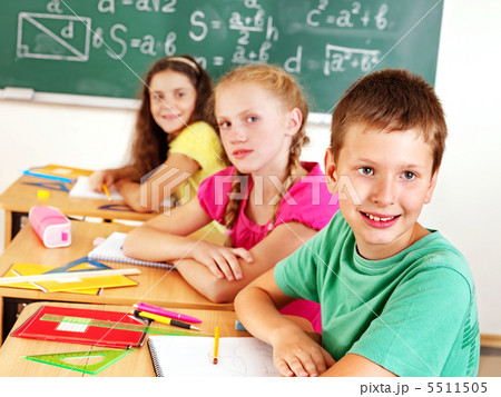 School child writting on blackboard. School child writting on blackboard. 5511505
