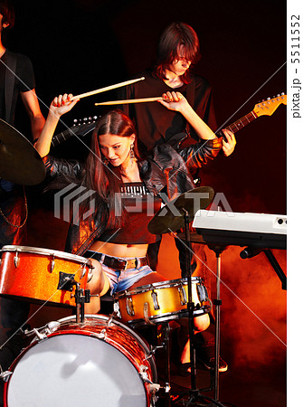 Band playing musical  instrument. 5511552