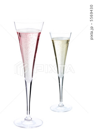 A glass of champagne, isolated on a white background. A glass of champagne, isolated on a white background. 5569430