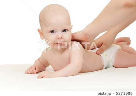 mother massaging her baby boy mother massaging her baby boy 5571989