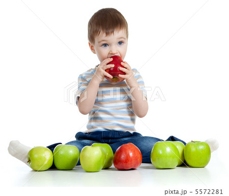 child with healthy food apples 5572281