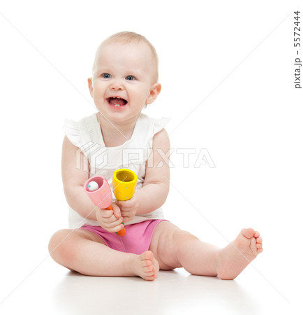 baby playing with musical toy baby playing with musical toy 5572444