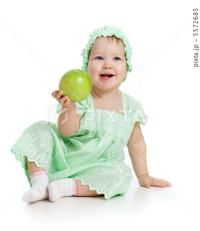 baby girl with green apple baby girl with green apple 5572685