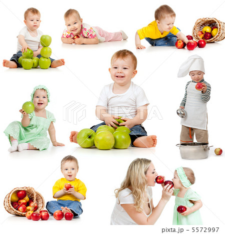 Cute children with healthy food apples. Isolated on white backgr Cute children with healthy food apples. Isolated on white backgr 5572997