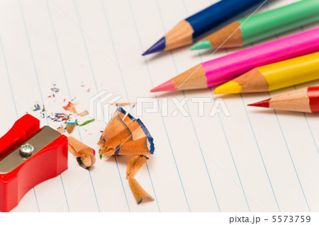 Color pencils and sharpener shaving 5573759