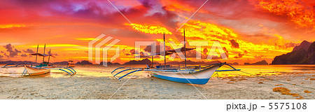 Boat at sunset 5575108
