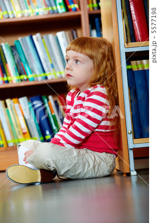 Girl in library Girl in library 5577198