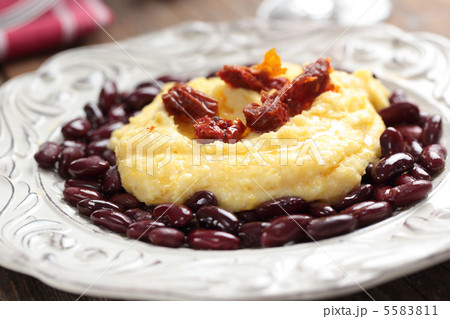Polenta with beans and tomato Polenta with beans and tomato 5583811