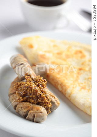 Sausages with omelet Sausages with omelet 5583894