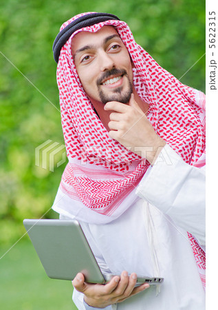 Arab on the street in summer Arab on the street in summer 5622315