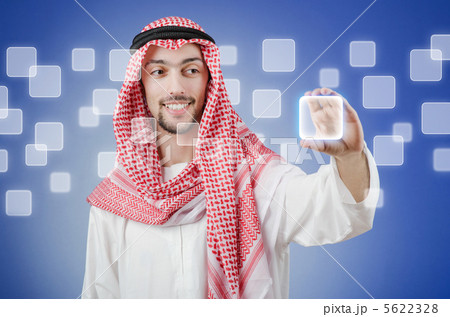 Young arab pressing virtual buttons Young arab pressing virtual buttons 5622328