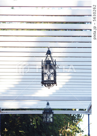 decorative lantern hanging in the arbor 5630262