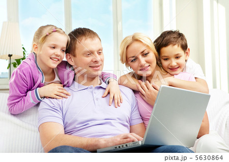 Family and laptop Family and laptop 5630864