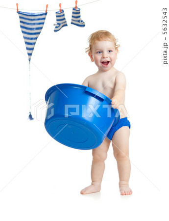Happy kid washing his accessories 5632543